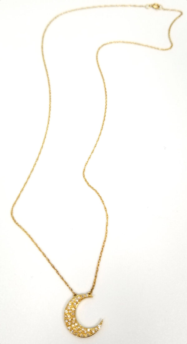 crescent moon diamond and 10K yellow gold necklace