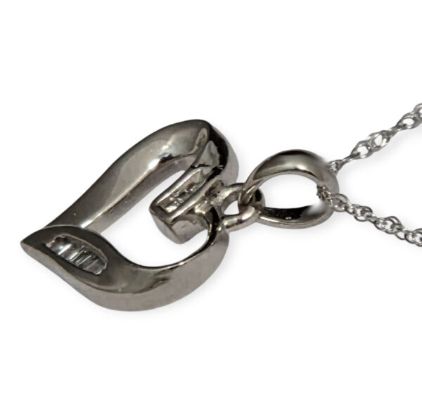 side view of dainty diamond heart necklace