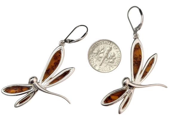 backside of amber dragonfly earrings with dime for size comparison