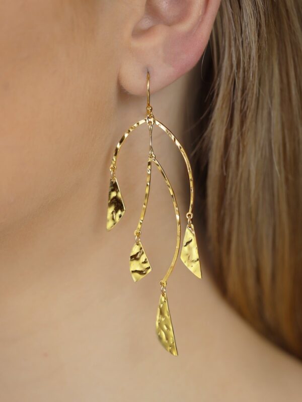 chandelier earrings from Holly Yashi on model