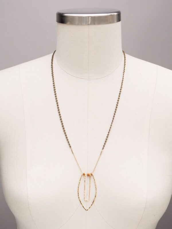 Long Insights necklace by Holly Yashi on mannequin