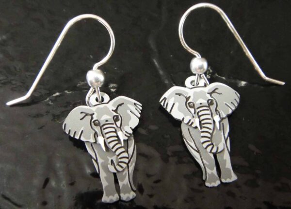 gray elephant earrings by Sienna Sky on black background