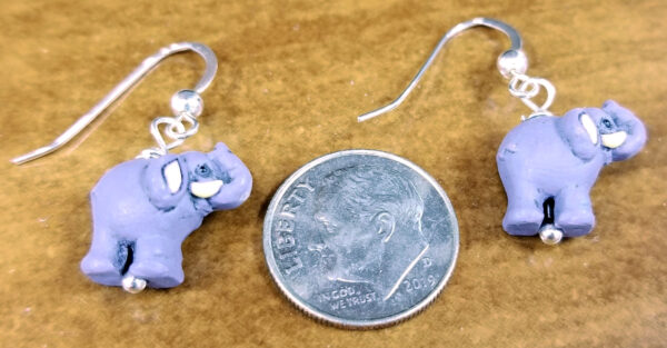 elephant earrings with dime for scale