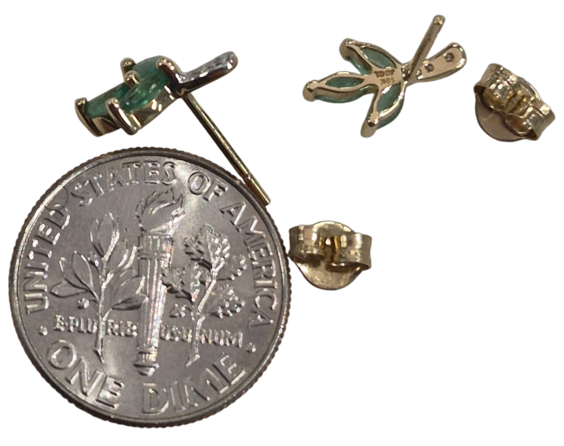 side view and backside of leaf earrings with dime for size comparison