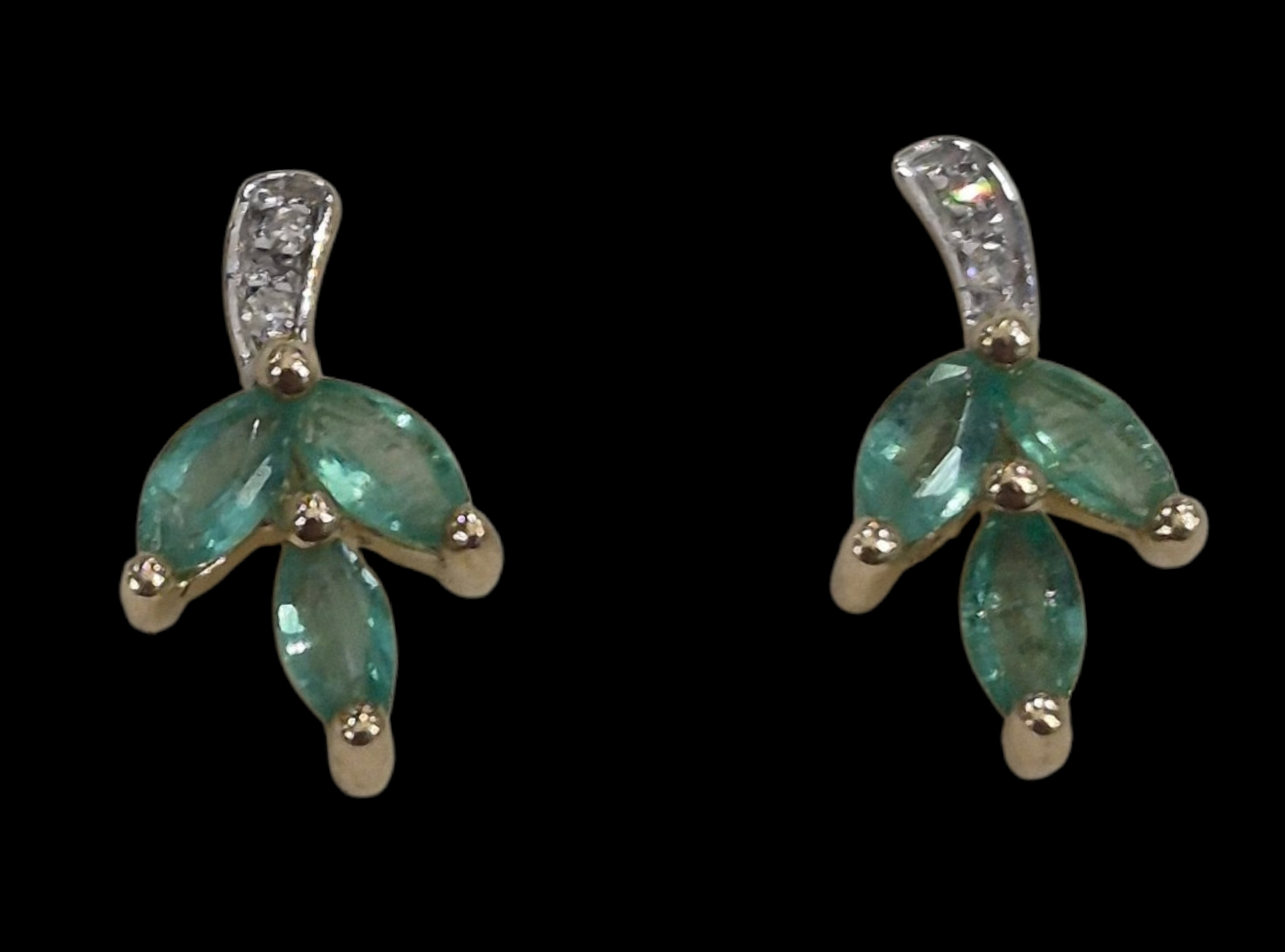 diamond and emerald leaf stud earrings