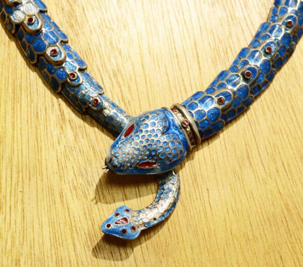 close-up of detailed sterling silver and enamel snake statement necklace handmade in Taxco, Mexico