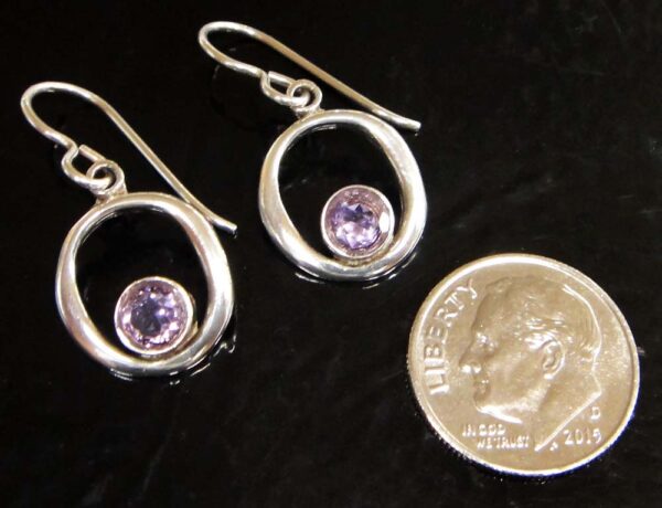 These amethyst and sterling silver earrings are handmade by Sonoma Art Works ( pictured with dime for scale).