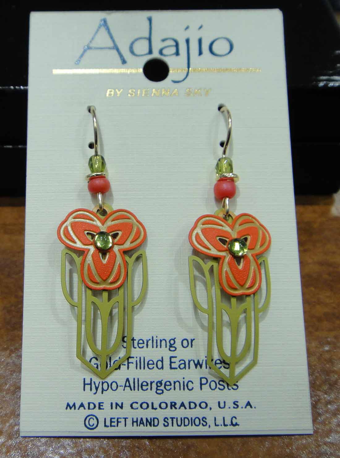 Orange poppy earrings on earring card