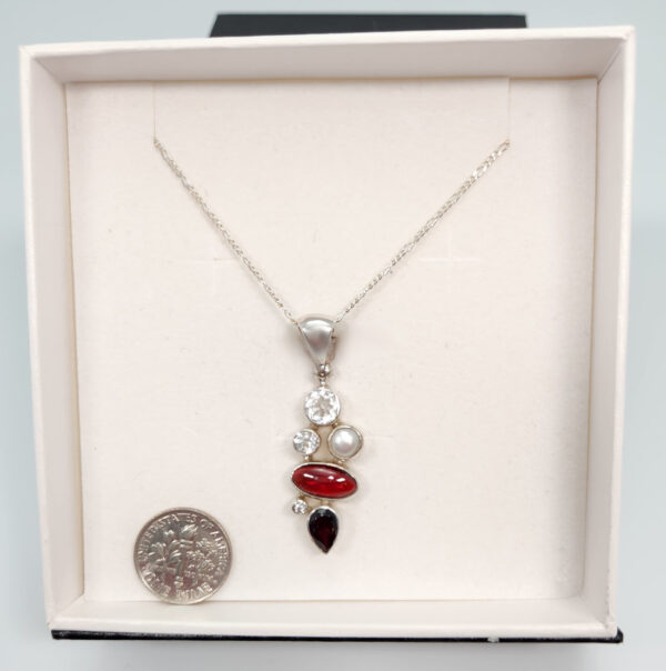 red garnet, white topaz, fresh water pearl, and sterling silver necklace with dime for size comparison