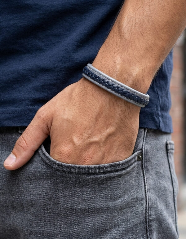 gray and blue leather bracelet on model