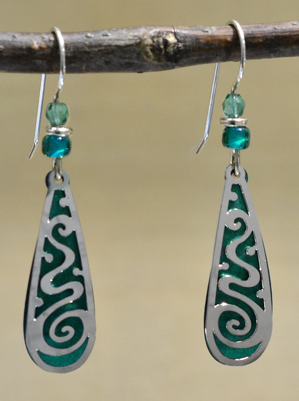 green and teal silvertone swirl Adajio earrings