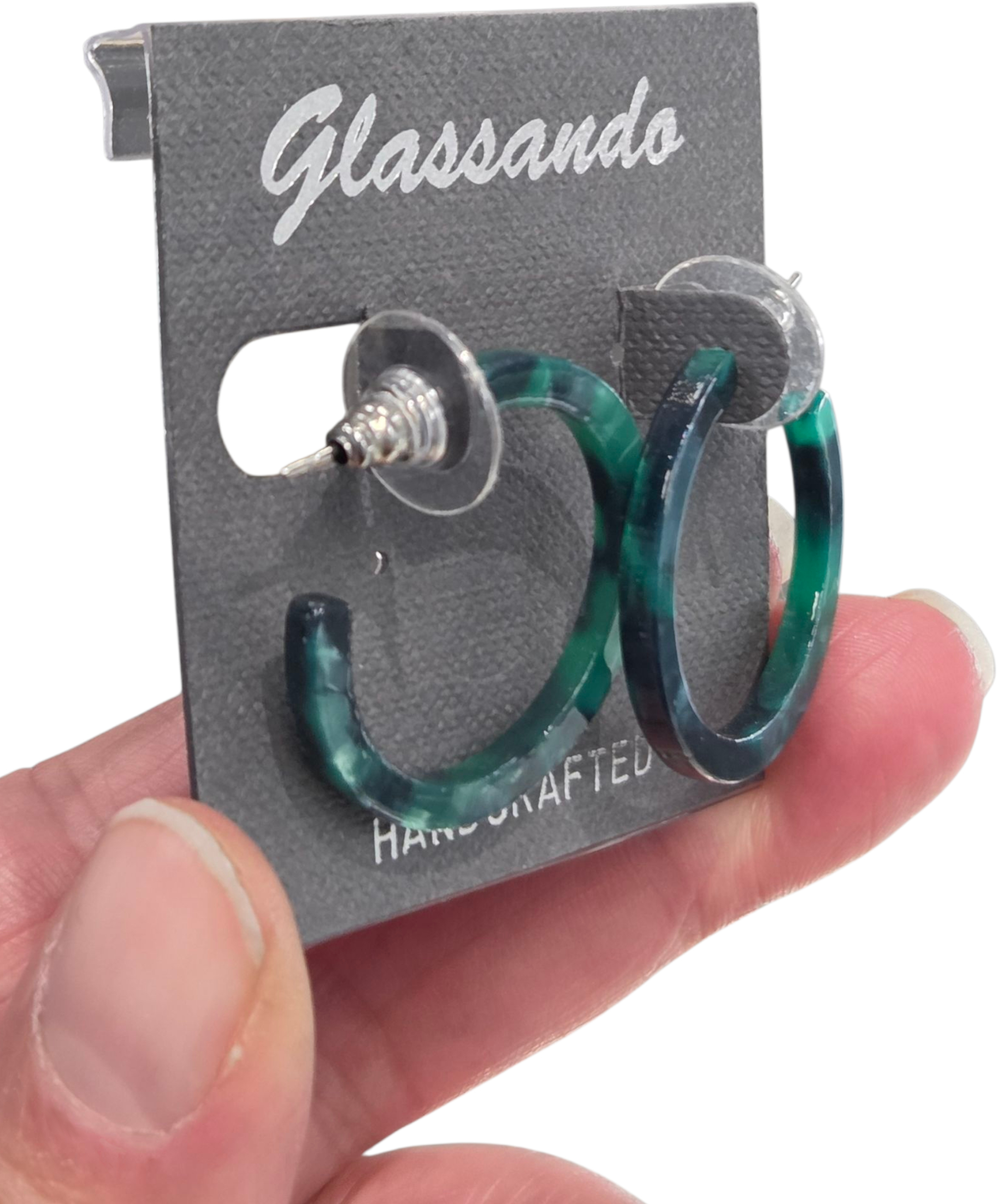 side view of green hoop earrings