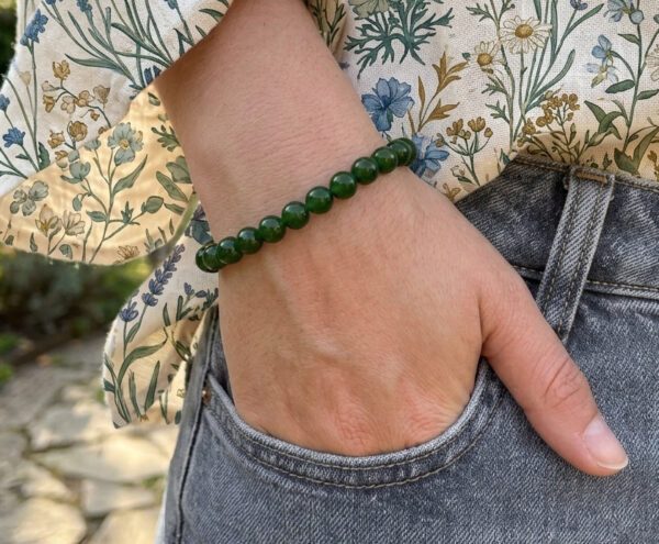 green jade stretch bracelet on model