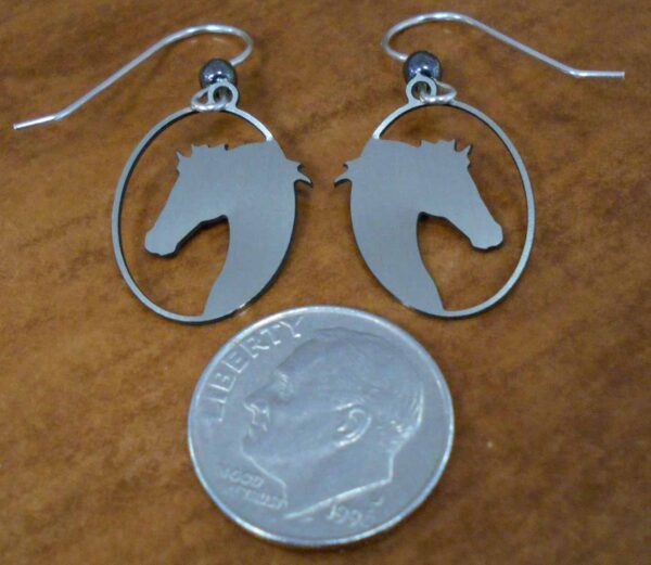 back of horse head earrings with dime to show scale