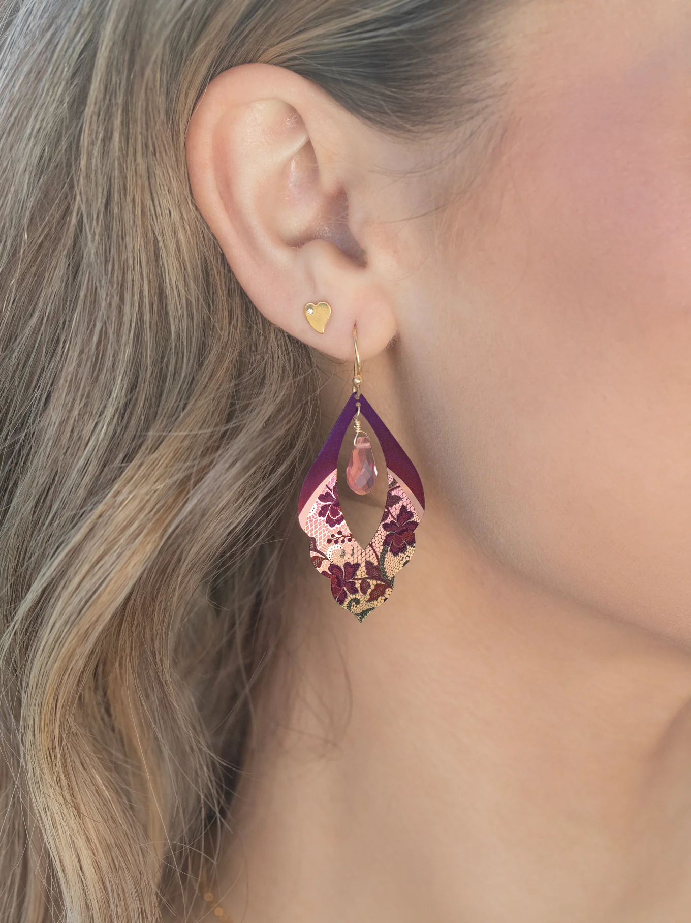 vintage lace inspired burgundy earrings by jewelry designer Holly Yashi, on model