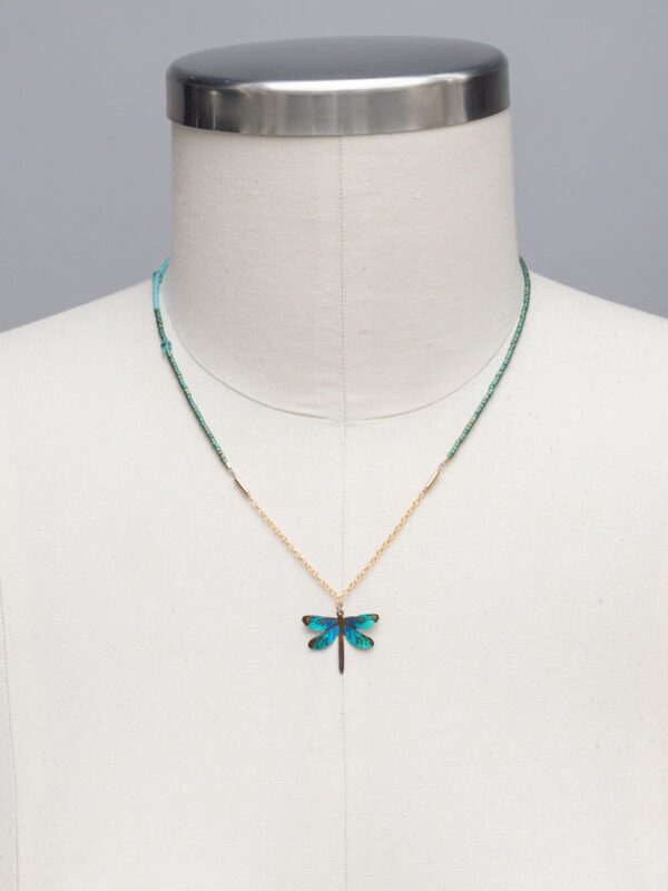 dragonfly necklace on mannequin