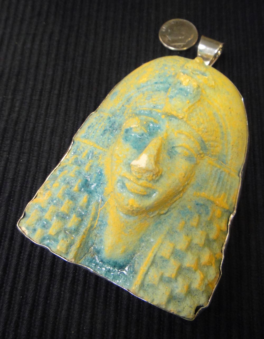 King Tutankhamun bust and sterling silver pendant with dime for size