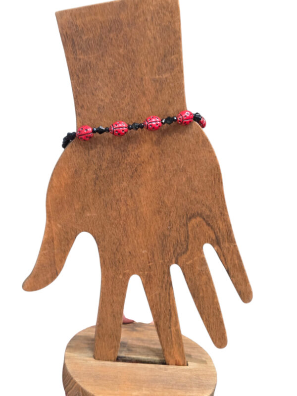 ladybug bracelet on hand form