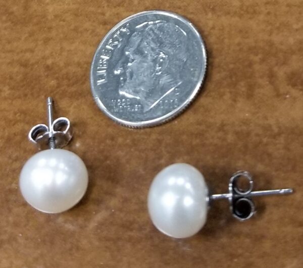 large fresh water pearl and sterling silver post earrings with dime for scale
