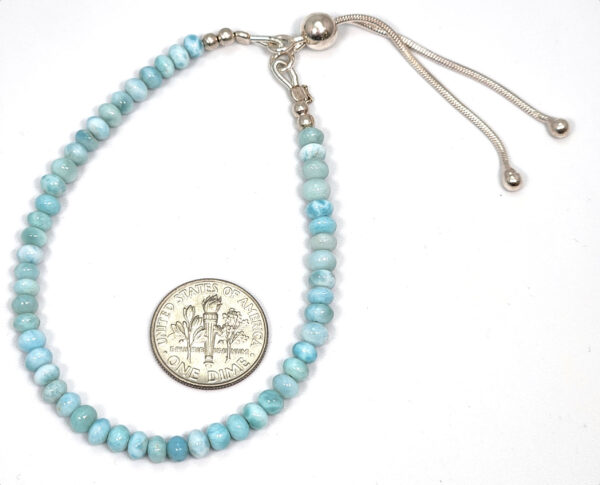larimar beaded bracelet with dime to show scale