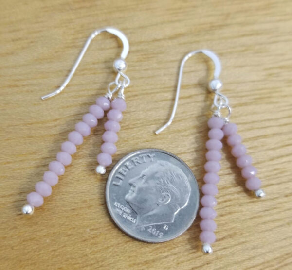 light lavender art glass and sterling silver earrings with dime for scale