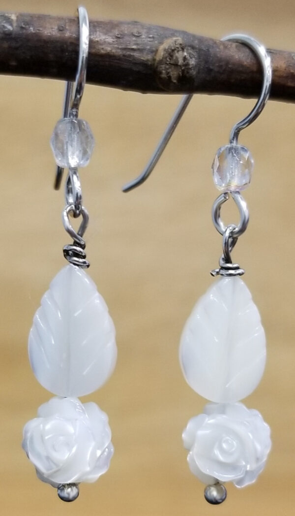 carved white mother of pearl rose with leaf and sterling silver earrings