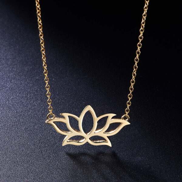 gold-plated sterling silver lotus flower necklace on black background