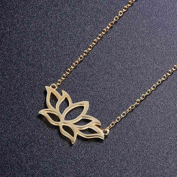 gold-plated sterling silver lotus flower necklace on black background, side view