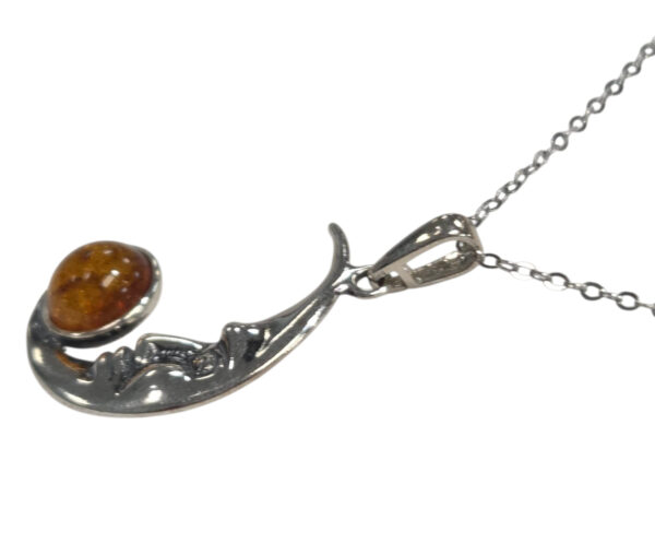 side view of man in the moon necklace