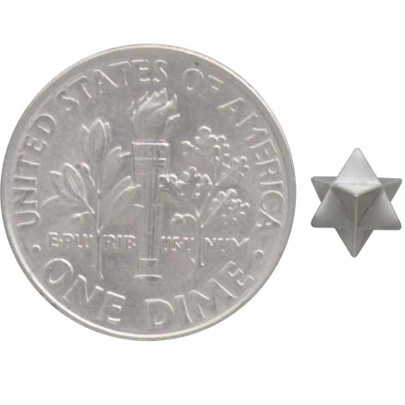 merkabah stud earrings with dime for scale