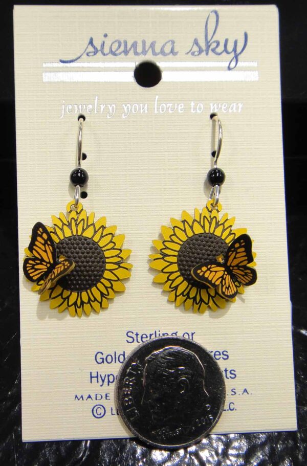 monarch butterfly on sunflower earrings with dime to help gauge scale