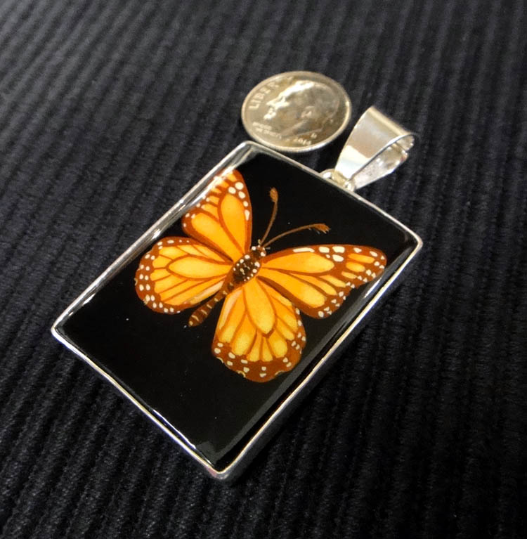 Hand painted monarch on black agate pendant