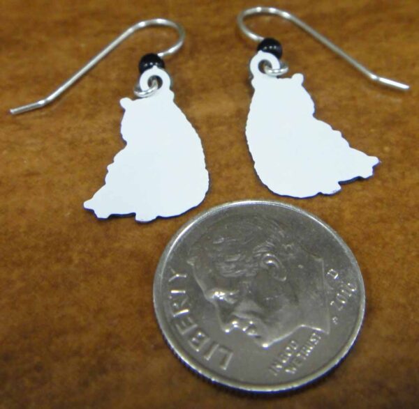 Back of Sienna Sky panda dangle earrings (pictured with dime for scale)