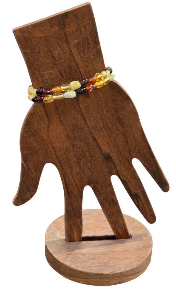 Multicolor Baltic amber bracelet on handform