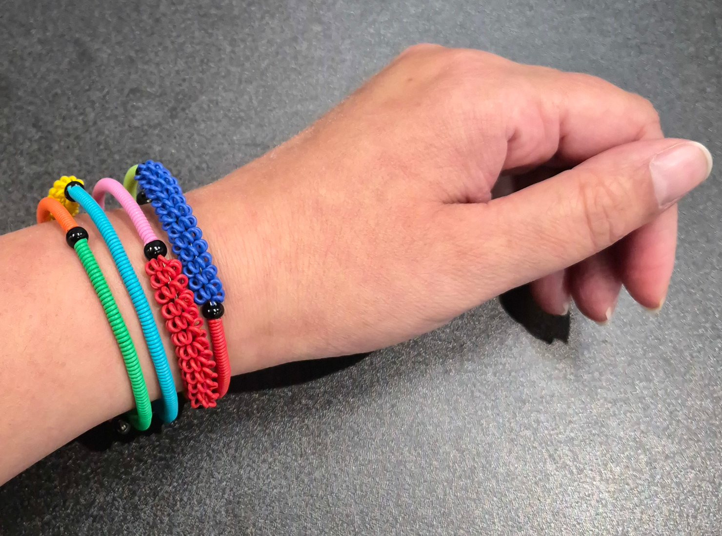 multicolor telephone wire bracelet on model