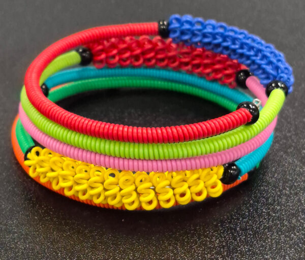 multicolor repurposed telephone wire spiral bracelet in multicolor