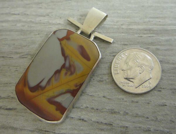 Handmade noreena jasper and sterling silver pendant shown with dime (not included) for scale