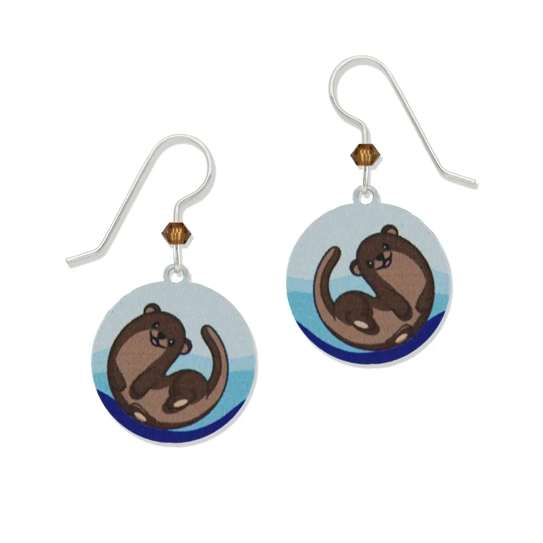swimming otter earrings