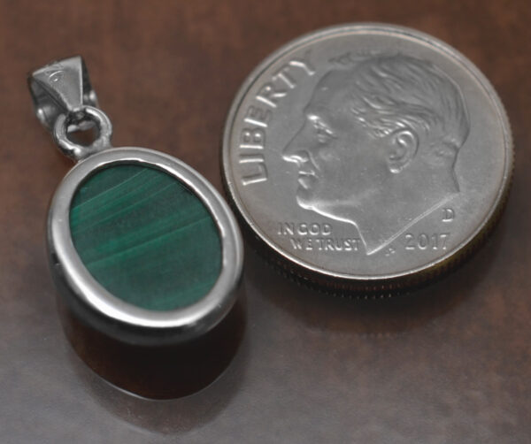 back of petite green malachite pendant with dime