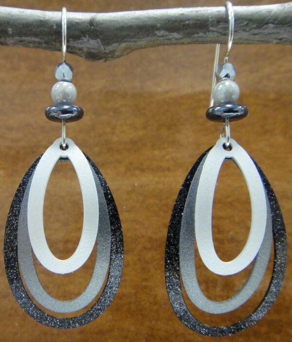 white, gray, and black drop earrings
