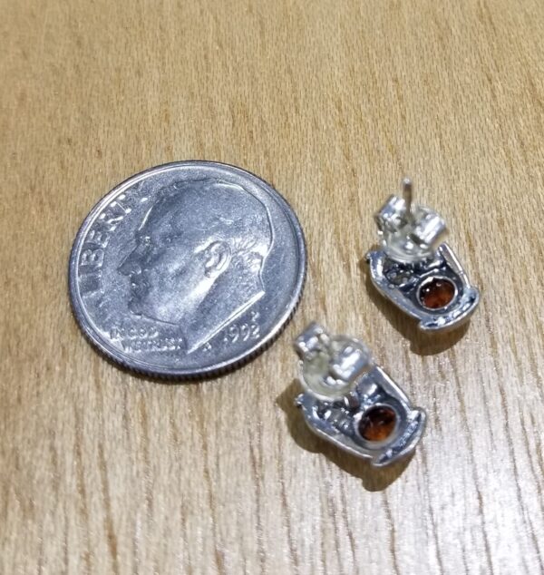 back of owl earrings with dime for scale