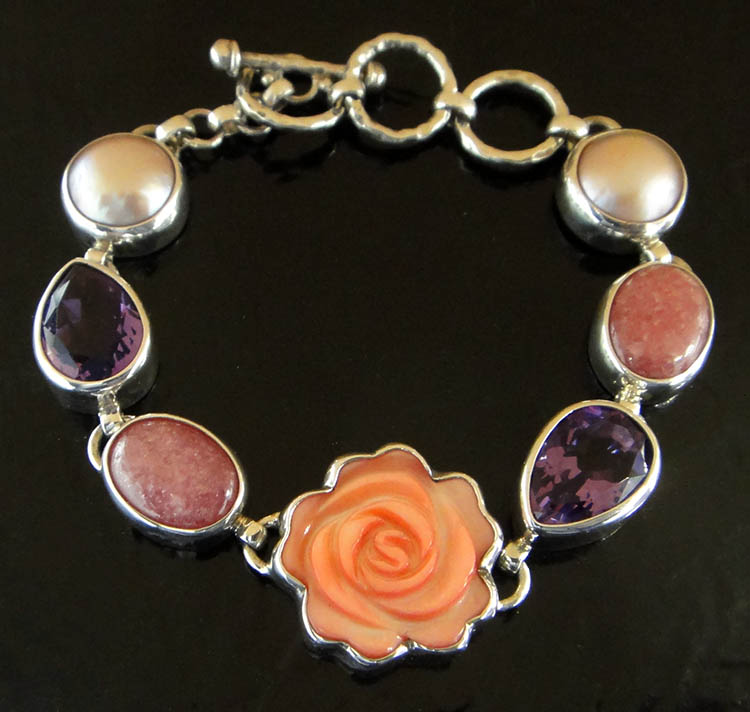 Carved pink mother of pearl shell rose with amethyst and pearl