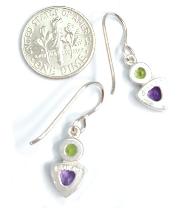 backside of peridot and amethyst earrings with dime for size comparison