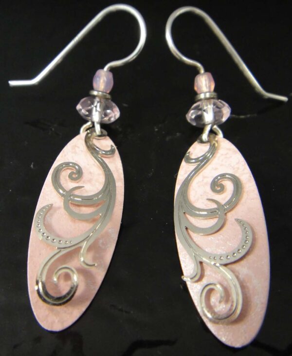 These pink dangle earrings are handmade by Adajio.
