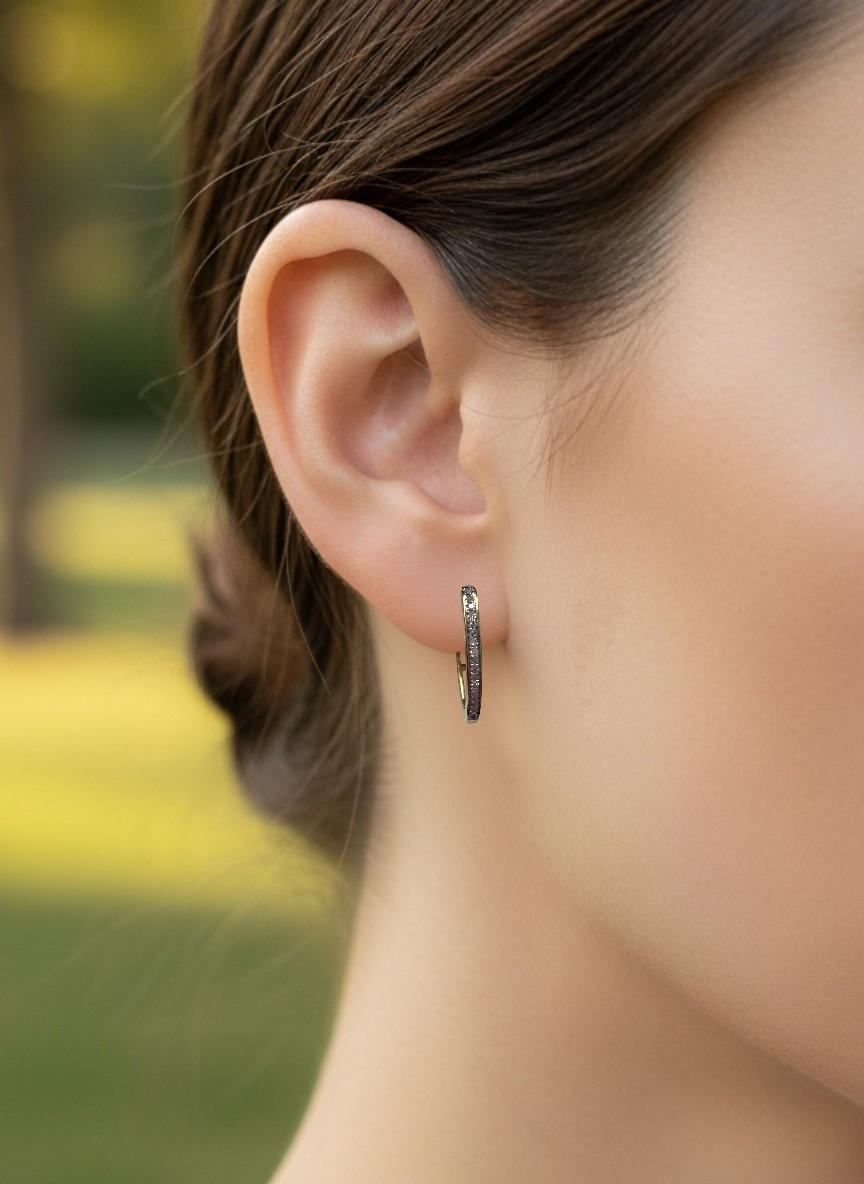 pointed hoop earring on model