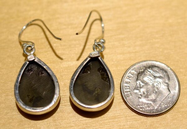 back of polished pyrite drop earrings with dime
