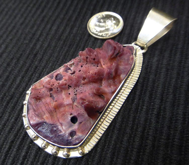 large rough purple spiny oyster shell and sterling silver pendant with dime for size