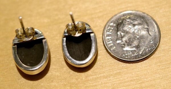 back of polished pyrite earrings with dime