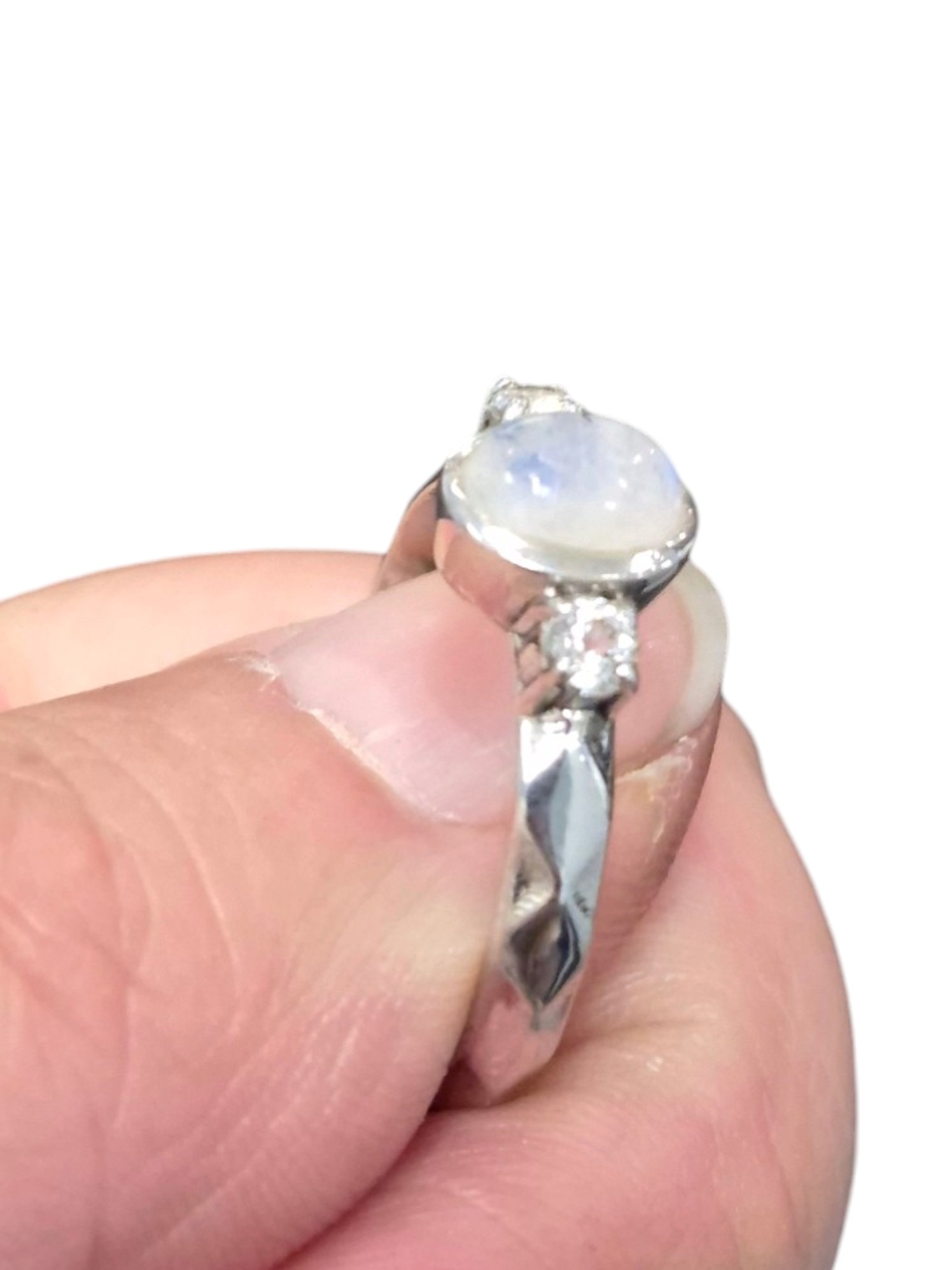 side view of rainbow moonstone ring