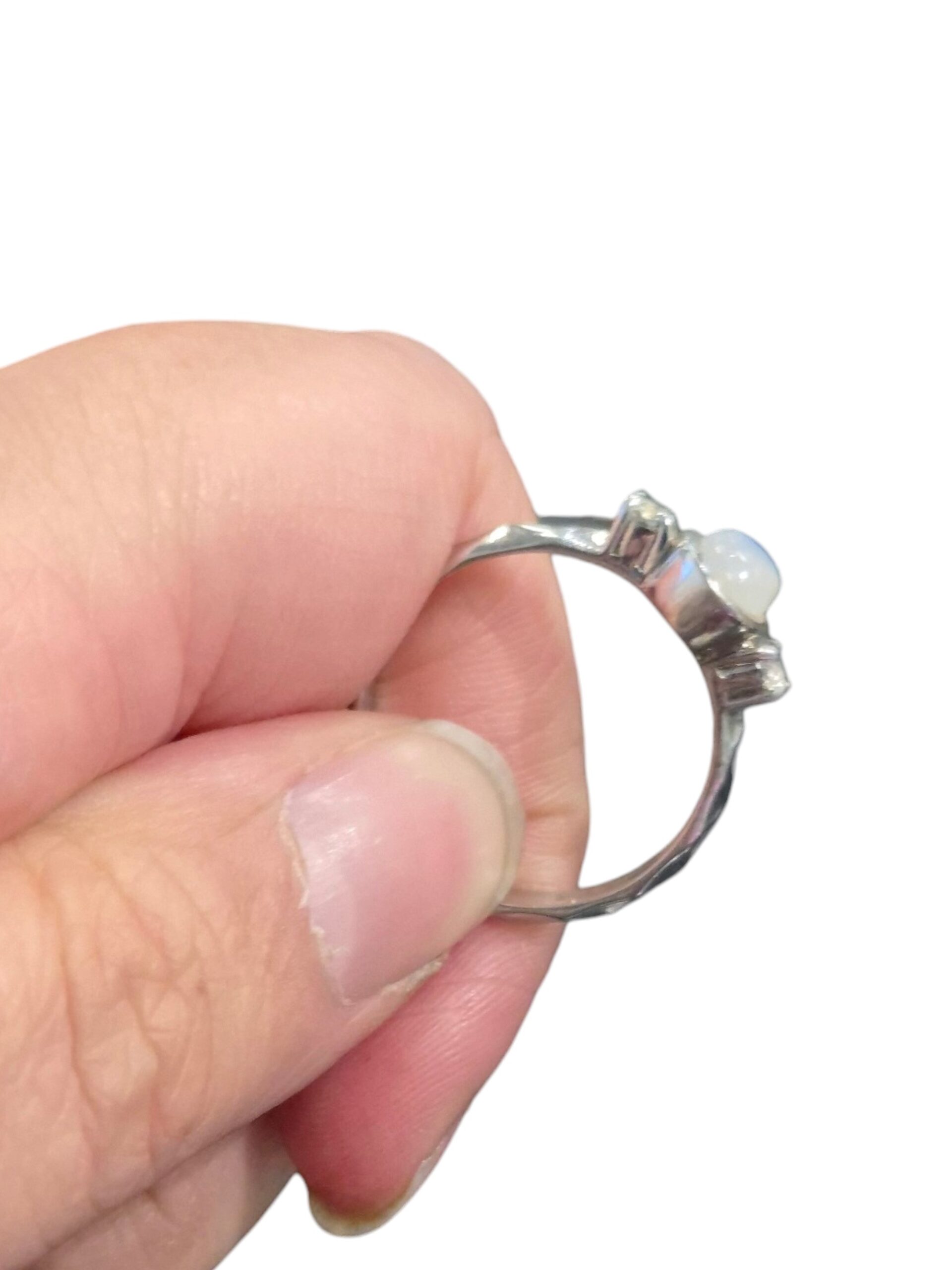 side view of rainbow moonstone ring